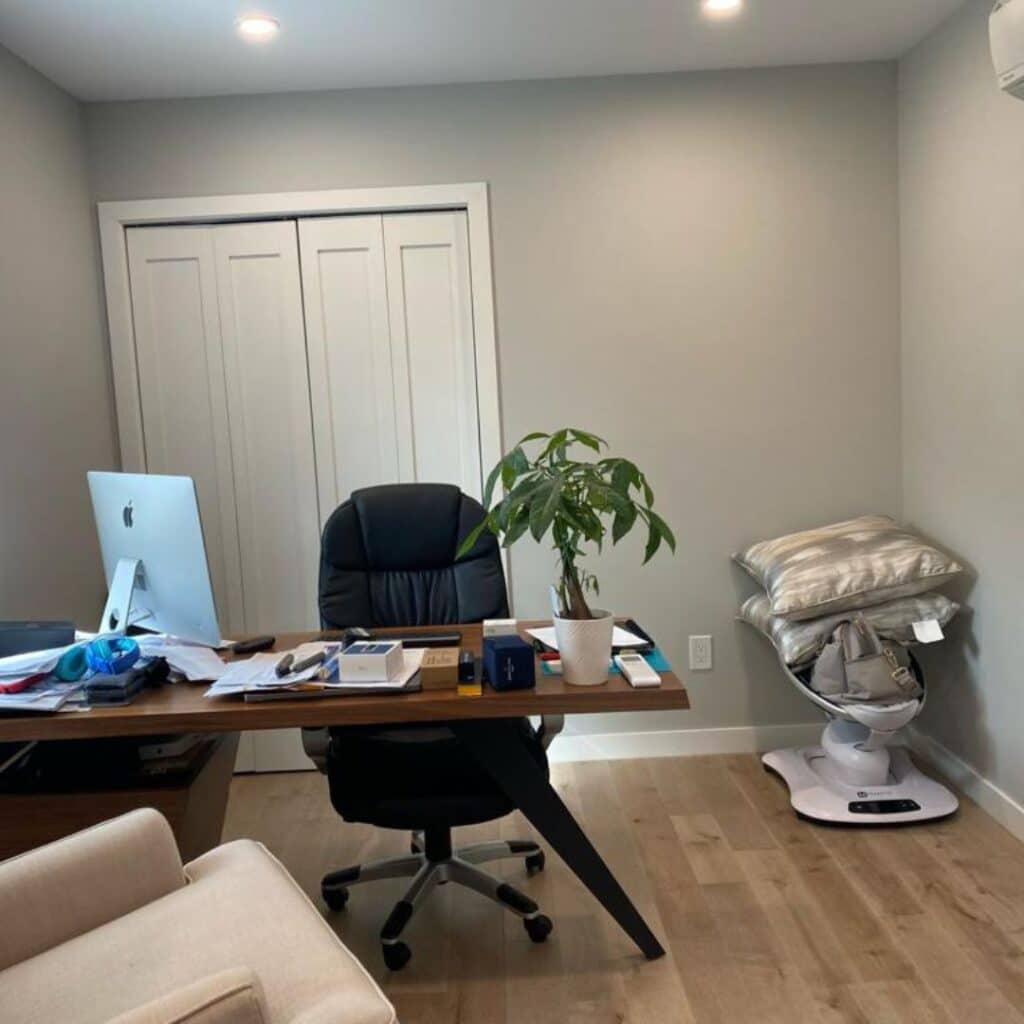 Clean office space with a tidy desk and organized environment, showcasing our office cleaning services. Providing spotless results for commercial spaces, ensuring a productive and welcoming atmosphere.